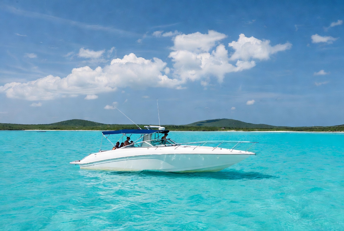 Private charter boat on turquoise Bahamas water